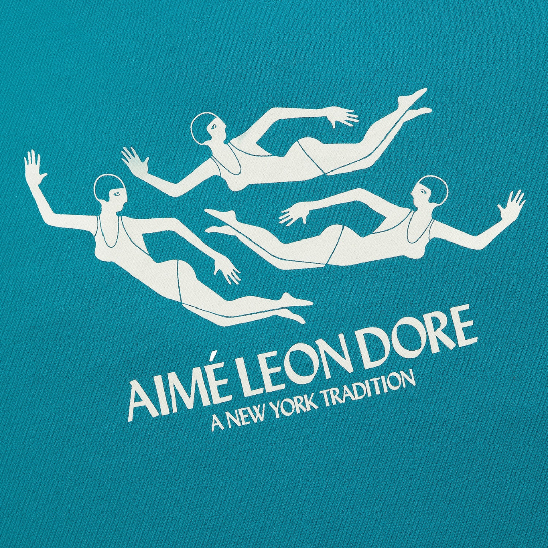 Aimé Leon Dore Swimmers Tee Kayaking