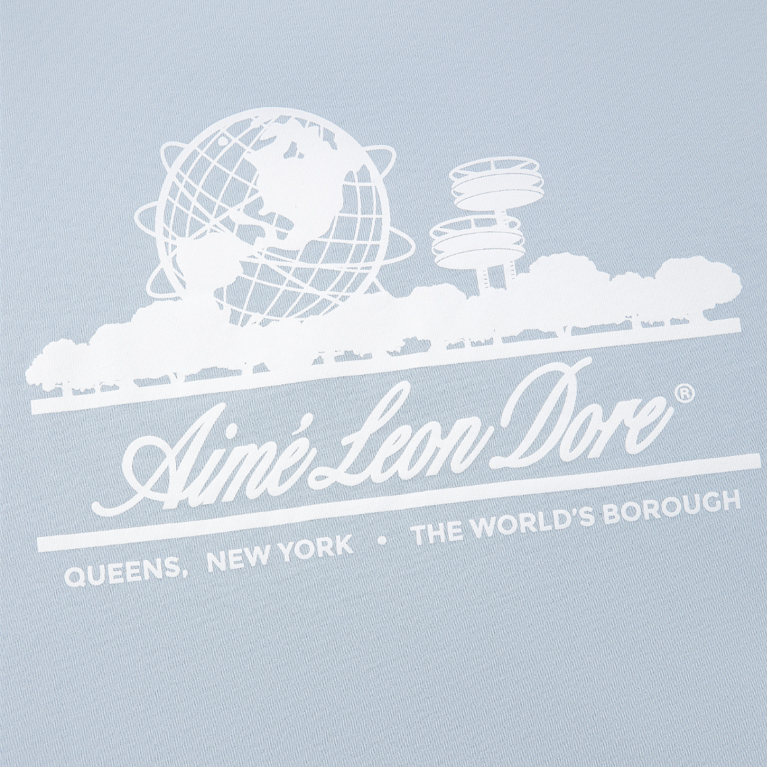 Aimé Leon Dore Unisphere Tee  Kentucky Blue
